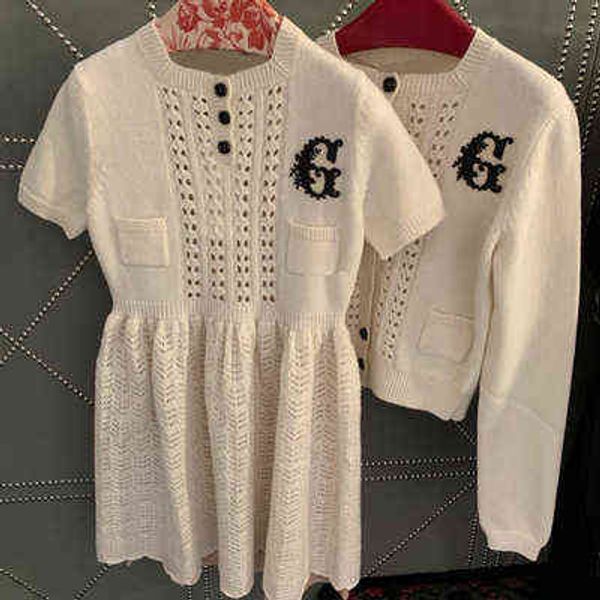 

hollow out dress winter new short sleeved bottomed skirt slim fitting fluffy knitted embroidered female, Black