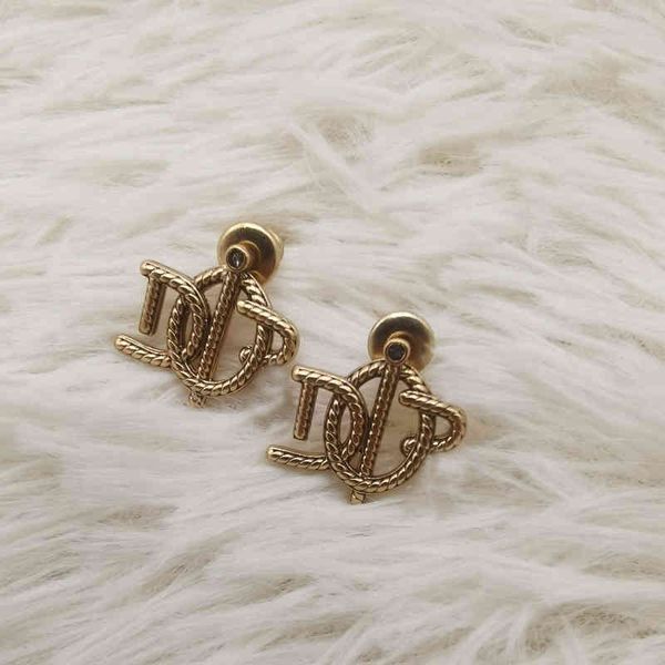 

2022 factory wholesale new di home sense personality earrings twisted rope minority simple women 4gk4, Golden
