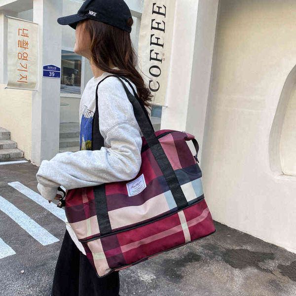 

duffle bags travel fitness luggage women's short distance travel bag portable large capacity super portable 220707