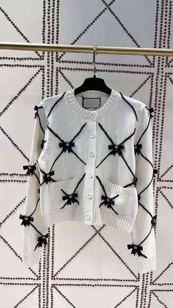 

women's sweaters [] autumn bowknot beading temperament slim round neck cardigan long sleeved sweater e5hc, White;black