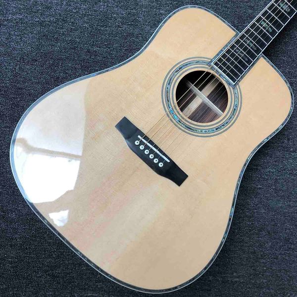 

41" solid spruce acoustic guitar with rosewood back side rosewood fingerboard