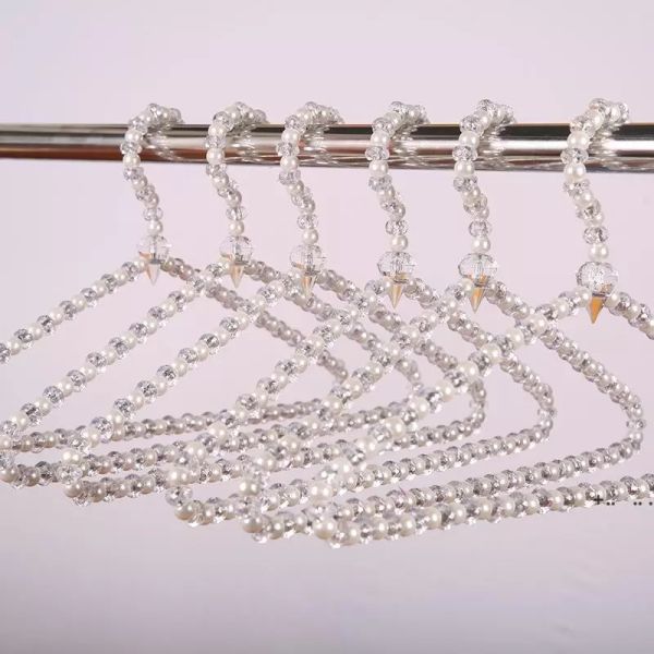 Scaffale per abbigliamento Perline di cristallo Appendiabiti perla Appendiabiti antiscivolo Triangolo Arco Abito da sposa Mostra Negozio di costumi Cornice per abiti