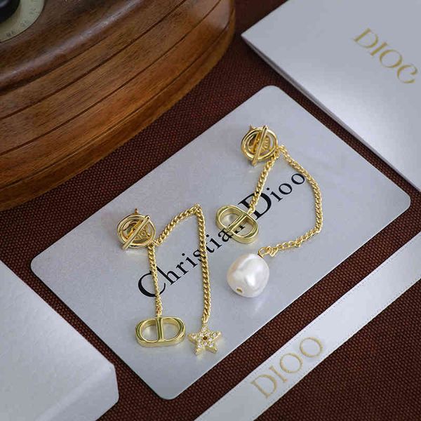 

2022 factory wholesale new asymmetric female star same 925 silver needle earrings, Golden