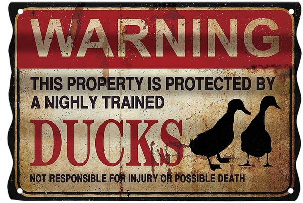 

corrutage shaped tin sign this property is protected by highly trained duck retro wall decor home decor 8x12 inch
