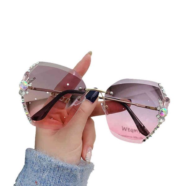 

2022 fashion brand design sunglasses factory direct sales trendy clothing women's 2022 diamond rimmed large thin uv crystal frameless, White;black