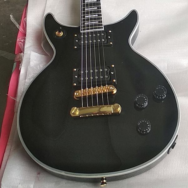

customized black double cut electric guitar with ebony fretboard and frets nibs