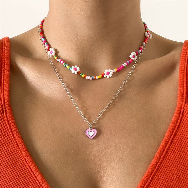 Nuove perle di riso creative Collana a forma di margherita a colori a contrasto Collana da donna geometrica a forma di cuore di pesca a goccia fresca