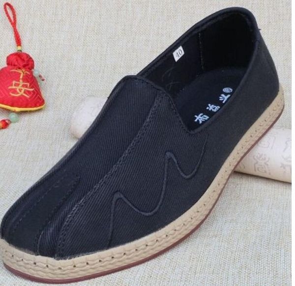 Vecchie scarpe di stoffa. sottopiede in stoffa qiao4s nero cat