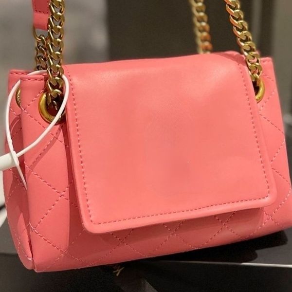 

the new handbag is decorated with diamond quilted bag size grosgrain lining