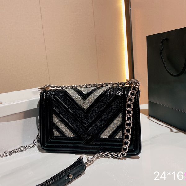

2022 european style sequin fashion ladies shoulder bag cowhide large capacity 24cm black outdoor sacoche female imitation brand handbag coin