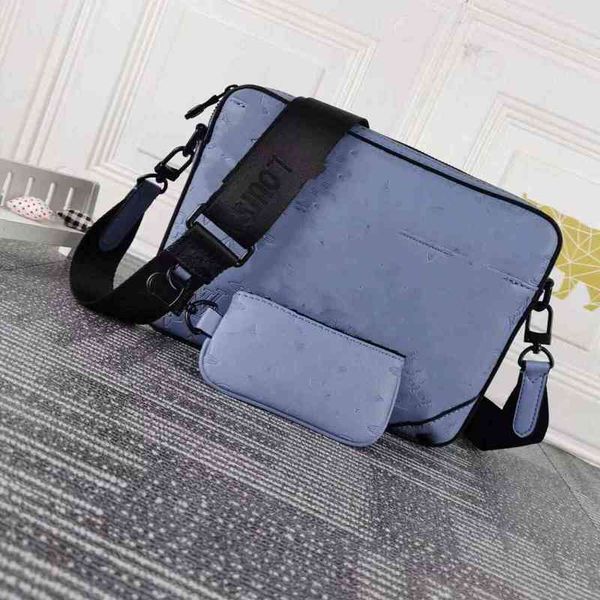 

m69827 embossed taigarama leather men's postman bag with spring clasp now has spacious front pocket and double inner pocket
