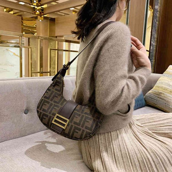 

20% off sitewide 2022 luxury bags female french stick armpit bag net red foreign air canvas messenger bag