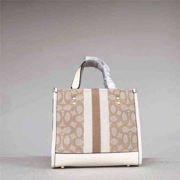 

family c new mini vertical small canvas hand held single shoulder diagonal2022 luxury brand fashion design versatile ladies bags