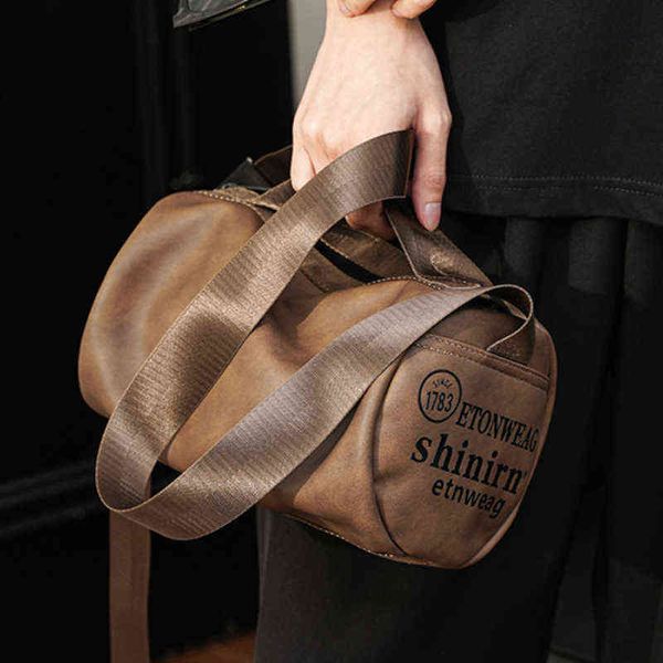 

duffel bags retro cylinder bag korean men's fashion portable chest bag 220626