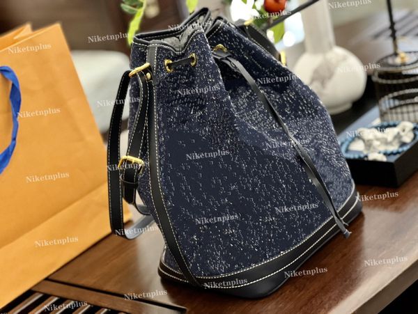

noeneo bucket bag navy blue denim shoulder strap large capacity bag drawstring closure monograms patten neonoe luxurys designers bags