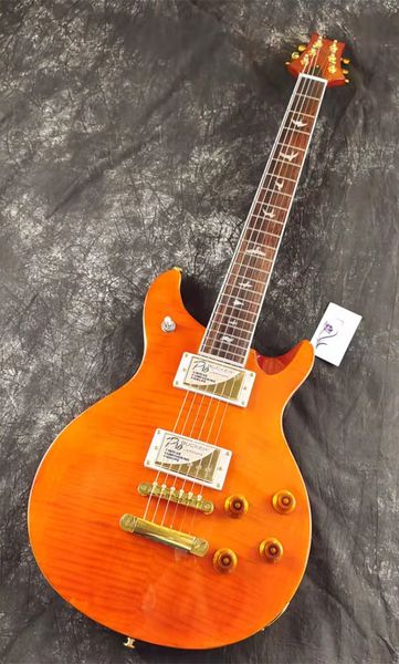 

electric guitar, orange tiger stripe, custom pickups,you get what you see