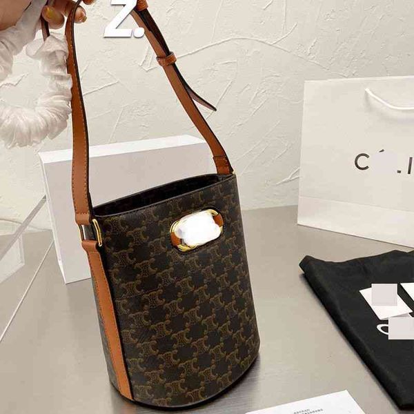 

old women's bucket arc de triomphe flower messenger korean version high-capacity first layer cowhide net red single shoulder