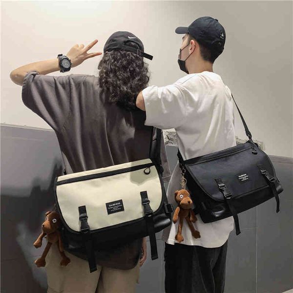 

handbags bags 2022 new high-capacity messenger male and female college students computer shoulder korean postman class backpack, Black;red