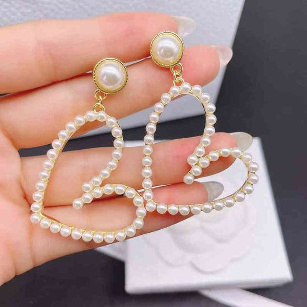 

new pearl love earrings baby's heart-shaped silver needle earrings, Golden