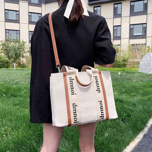 

purses super fire same casual letter canvas stripe portable one shoulder diagonal straddle tote women's bag new style