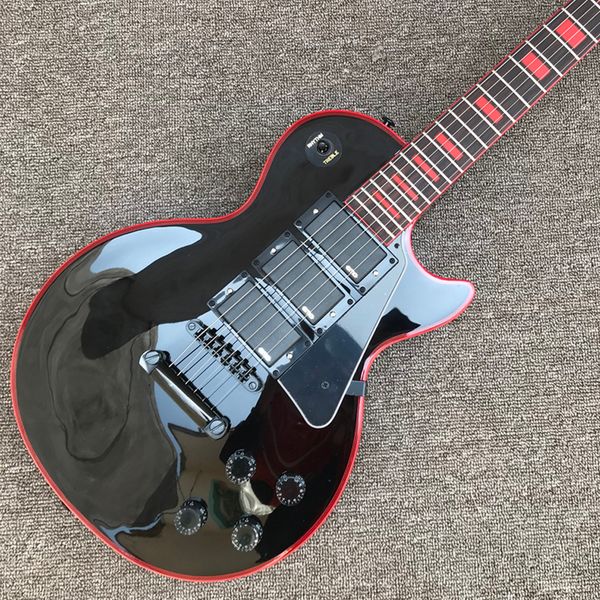 

custom lp electric guitar, black hardware, 3 pickups, red binding, rosewood fingerboard, solid mahogany body guitar