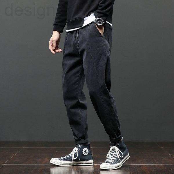 

men's pants designer spring and autumn casual pants men's slim little feet loose trend straight black trousers elastic waist leggi
