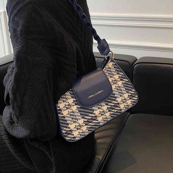 

2022 luxury brand fashion design versatile ladies bags red small new women's autumn msenger woolen shoulder