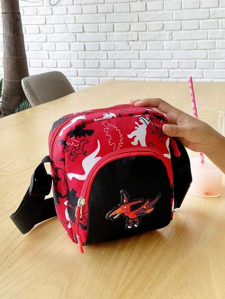 

kids dinosaur graphic crossbody bag she