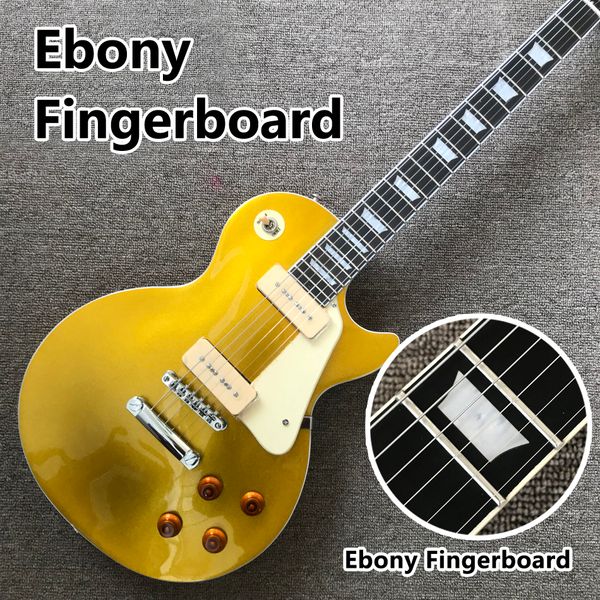

ebony fingerboard electric guitar, gold black back, two p90 pickups, solid mahogany body same of the pictures