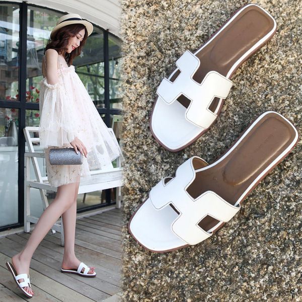 

herme orans slippers designer chaopai 2022 summer new slippers women wear fashionable flat bottomed travel and vacation beach shoes one word, Black