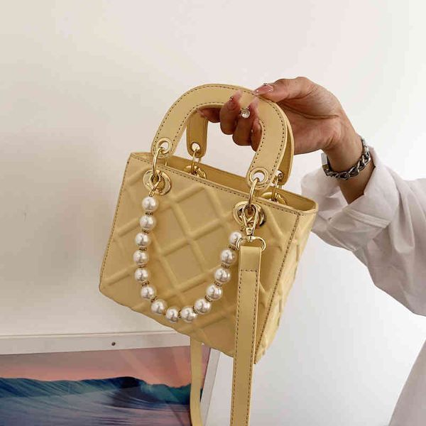 

factory direct sale ling ge embossed small female 2022 new fashion messenger portable princess swomen designer bag