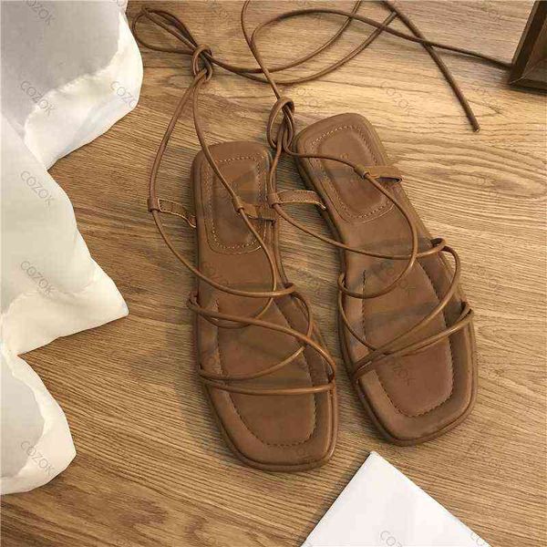

sandals women summer new 2022 beach fashion flat casual cross-tie open toe fairy style narrow band shoes black rome sandals y220521