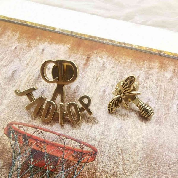 

2022 factory wholesale new advanced worn simple personality asymmetric dragonfly earrings women insg, Golden