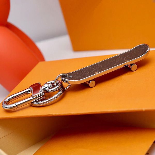 

designer keychains stainless steel men women car key chains keyring lovers keychain skateboard pendant key ring accessories, Silver