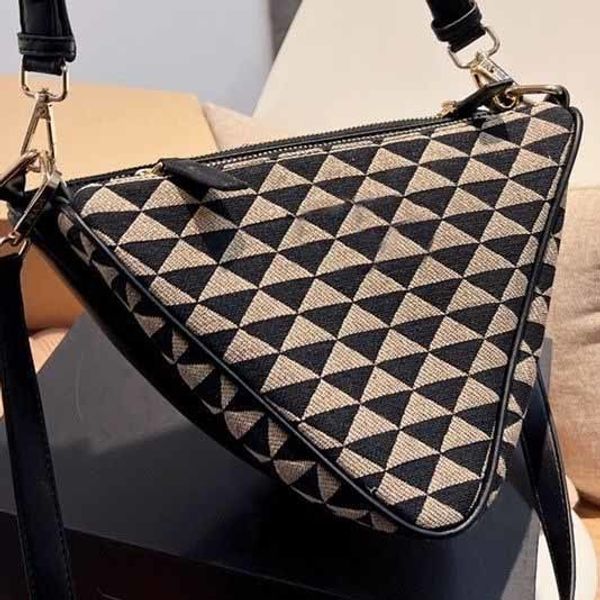 

2022 canvas triangle bag both sides fashionable and versatile ins messenger one shoulder women's handbags