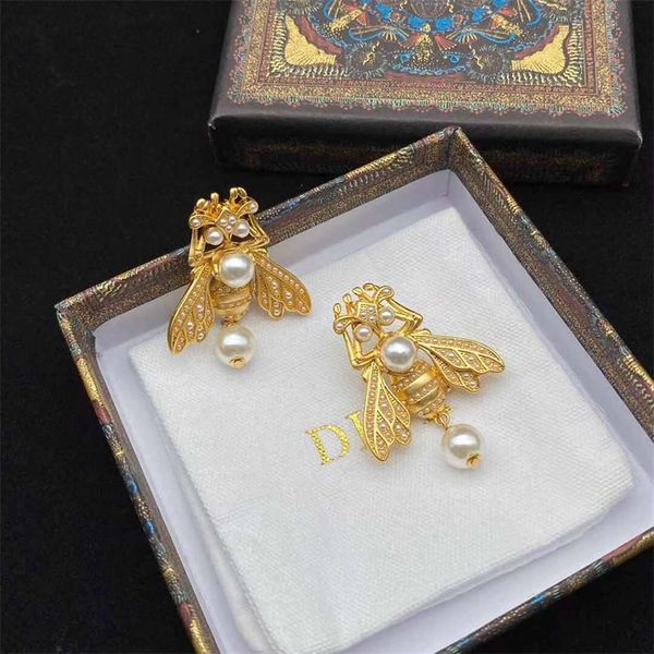 

designer jewelry online 2022 summer new gold-plated pearl earrings female net red same fashion earrings, Golden