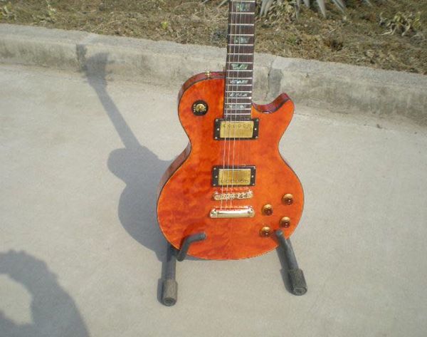 

orange lp electric guitar body mahogany maple building black gold hardware