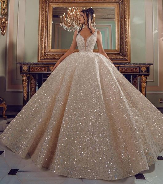 

sparkly luxury ball gown wedding dresses dubai church v neck beads crystal appliqued bride gowns sweep train princess gowns vog343, White