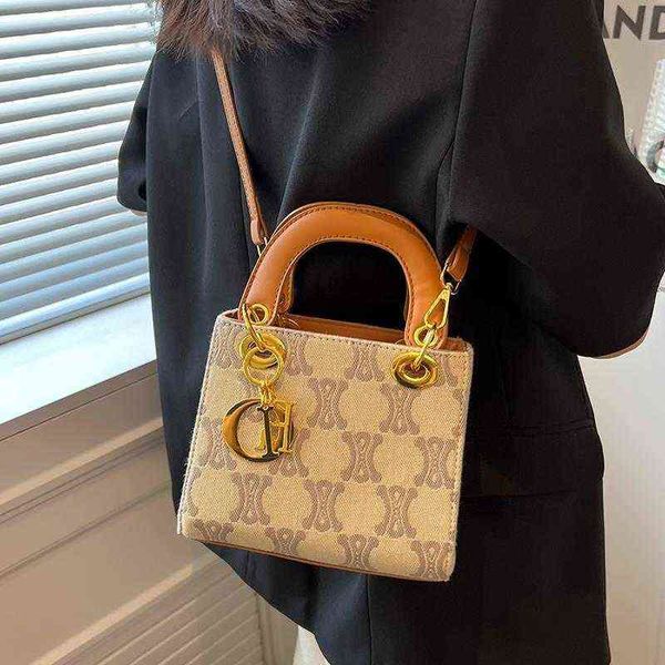 

fashion crossbody handbags designer woman female 2022 summer new fashion canvas single shoulder messenger foreign portable bag