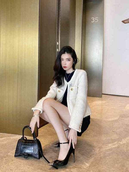 

outlet 2022 spring and autumn high-heeled shoes feminine temperament black patent leather pu caiying metal pointed thin heel button iron hea