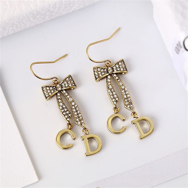 

80% off wholesale shop brass bow tassel earrings net red ear ornaments, Golden