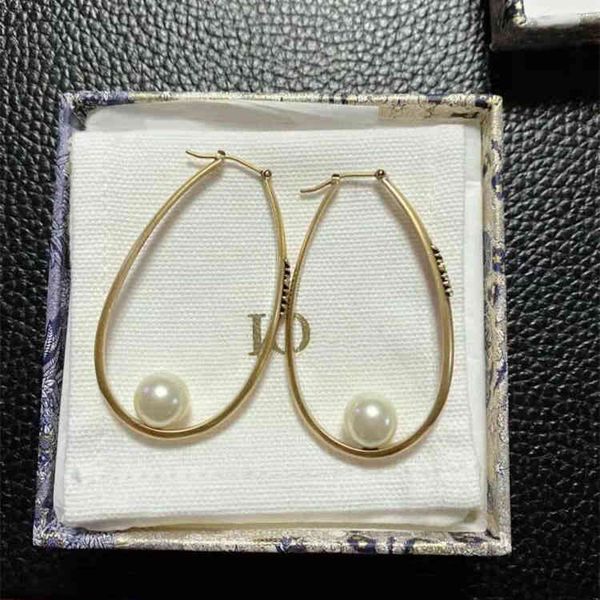 

2022 factory wholesale new di home oval pearl female geometric sense earrings hollowed out pryz, Golden