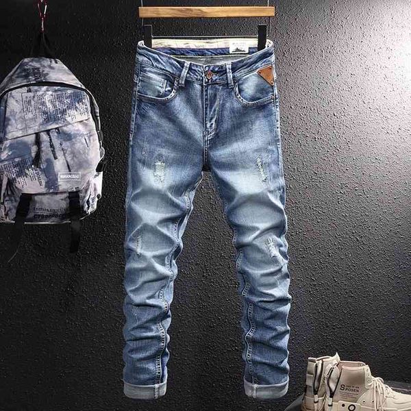 

men's jeans fashionable men's jeans are worn torn washed light blue trendy street micro elastic slim fitting trendy pants a12c