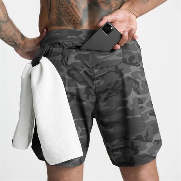 Homens que executam shorts de fitness shorts Única camada rápida seco de cor sólida design esportes de basquete masculino de moda d220615