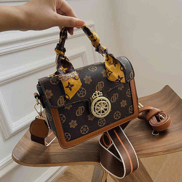 

2022 factory wholesale new textured net red women's fashion korean print portable small square wide shoulder belt messenger bag aibn