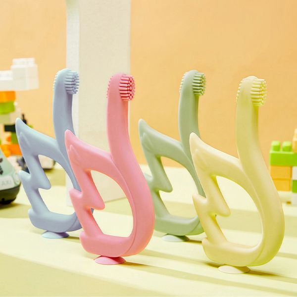 Nuovo arrivo bambino denti decidui spazzolino da dentizione giocattoli per 6-12 mesi neonati forma di cigno massaggiagengive giocattoli da masticare per la formazione