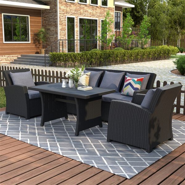 

outdoor patio furniture set 4-piece conversation set black wicker sofa sets with dark grey cushions