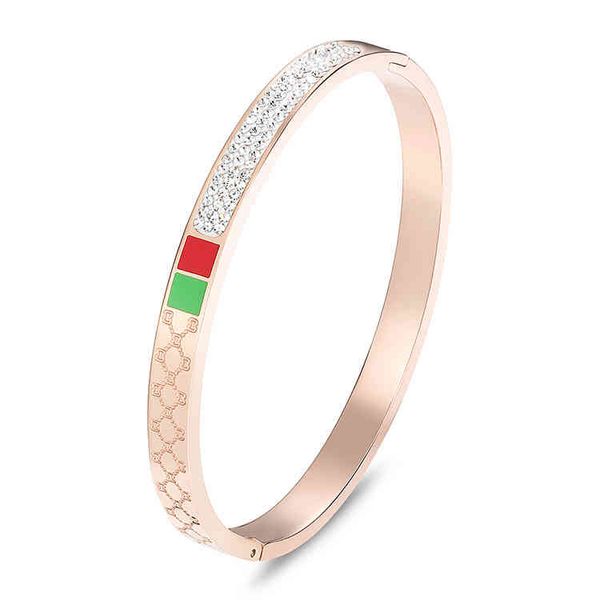 

the same red green diamond studded titanium rose gold plated is simple and versatile bracelet with stainls steel, Golden;silver
