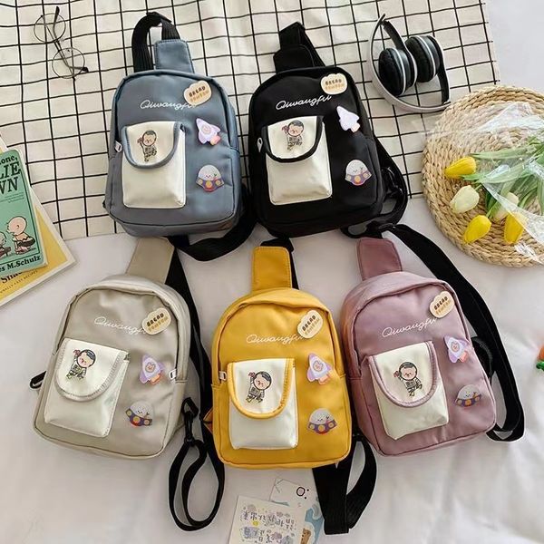 

fashion large capacity oblique chest pack triangle shoulder bag women handbag with brooch