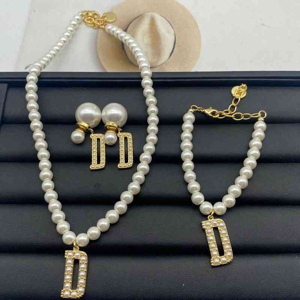 

2022 factory wholesale new dijia high sense pearl bracelet necklace female clavicle chain simple minority personality earrings, Golden